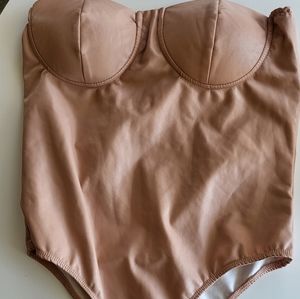 Sleeveless body suit